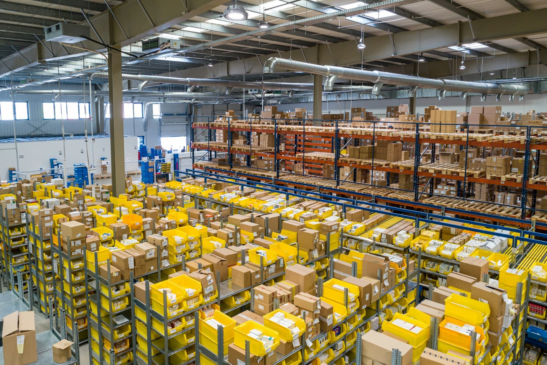 A global logistics hub with delivery van, cargo aircraft, shipping vessel, parcels, and digital route overlays